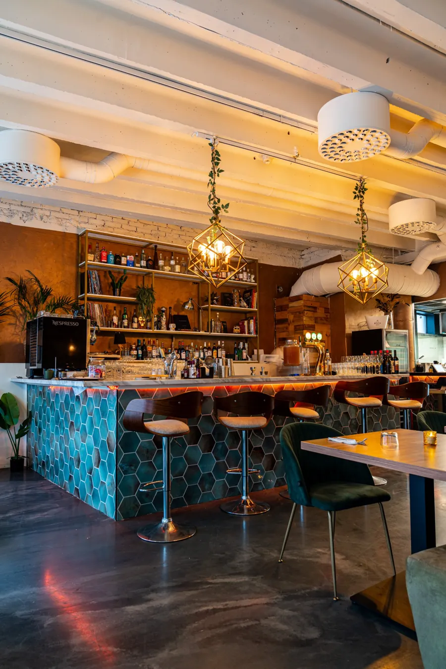 Tiled bar with warm under-counter lighting
